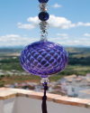 Boule de verre soufflée avec pompon : talsiman, boule de sorcière ou attrape-soleil