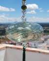 Blown glass sphere with tassel: oriental talisman, witchball, suncatcher