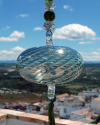 Boule de verre soufflée avec pompon : talsiman, boule de sorcière ou attrape-soleil