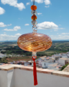 Boule de verre soufflée avec pompon : talsiman, boule de sorcière ou attrape-soleil