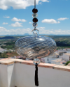 Blown glass sphere with tassel: oriental talisman, witchball, suncatcher