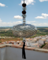 Boule de verre soufflée avec pompon : talsiman, boule de sorcière ou attrape-soleil