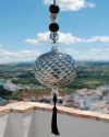 Boule de verre soufflée avec pompon : talsiman, boule de sorcière ou attrape-soleil