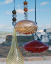 Blown glass teardrop shaped suncatchers, witch balls, talismans