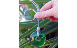 Recycled green glass pendant on silver leather cord with silver clasp