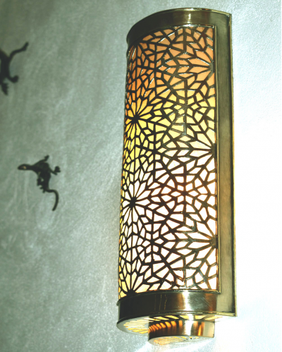 Silver copper Moroccan wall light with hand cut geometric pattern