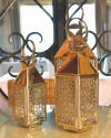 Trio of silver copper Moroccan lanterns with geometric star design