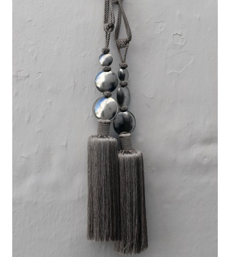 Large tassels, drapery pull backs with three silver hammered balls