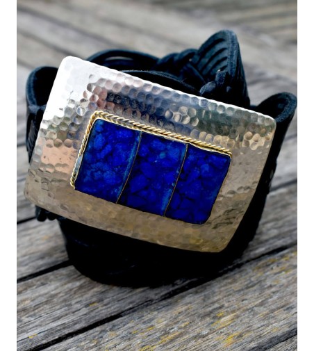 Black wide belt with large rectangular belt buckle and blue resin inset