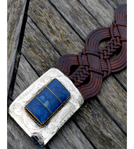 Brown wide belt with large rectangular belt buckle and a blue resin inset