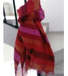 Orange, fuchsia and red pashmina shawl woven into colored striped fabric