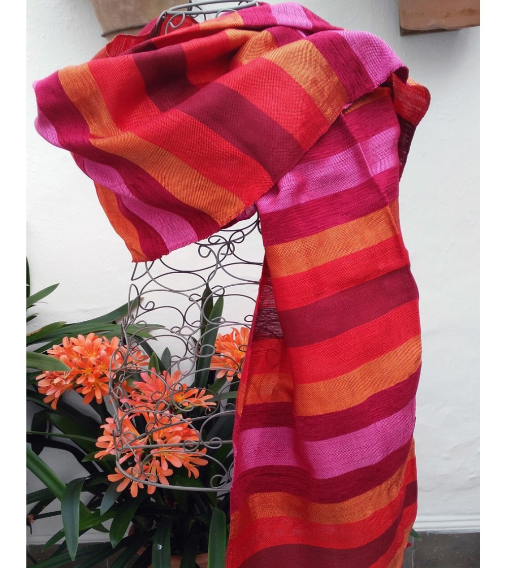 Orange, fuchsia and red pashmina shawl woven into colored striped fabric