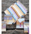 Crossbody evening bag in white, gold, pastel pink, blue and mauve stripes